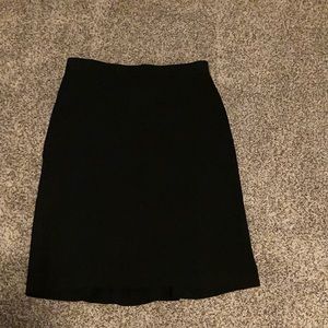 Black pencil skirt with flutter in the back